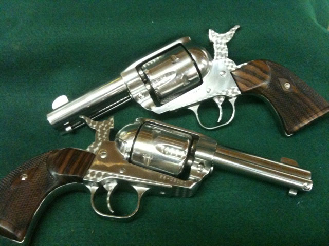 A pair of Sheriff's model Ruger Vaqueros with full race action job including 4 click half cock hammers, top gun jewelling package and gunfighter grips.  Custom built for 2008 Midwest Regional Champion and 5 time Indiana State Champ Doc Molar.