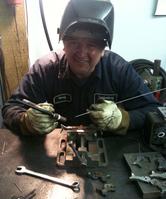 Randy Lee from LMS Welding getting ready to weld some Ruger half-cock hammers.